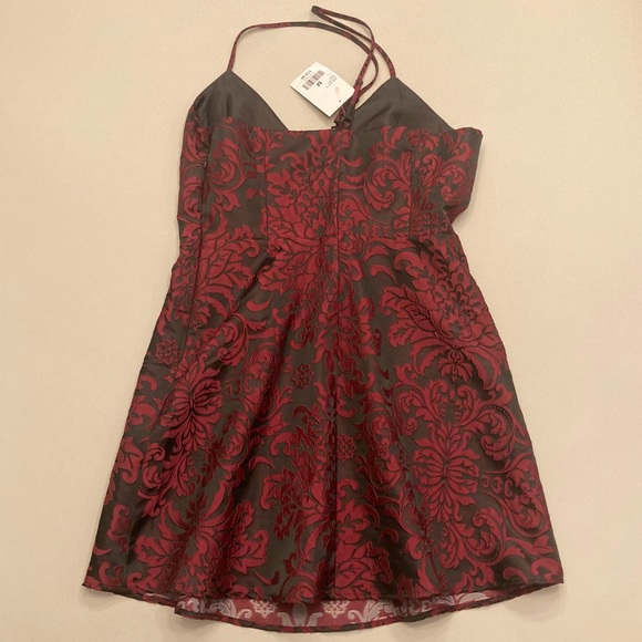 The brand is forever 21 , it’s Matte black with red velvet details, it’s medium - Picture 3 of 3